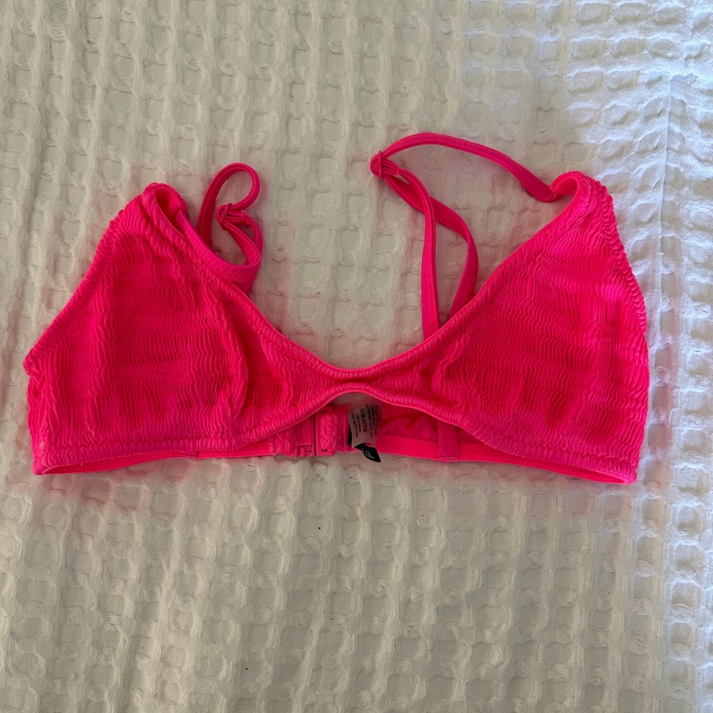 Triangl bathing suit! Top is a small and bottoms are a large!
